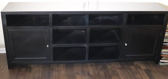 Contemporary Media Console Finished In Black, Made By Legends Furniture With Multiple Compartments For Storage