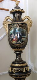 Tall And Impressive, Black And Gold Urn With Rams Heads And 2 Romantic Painted Panels.