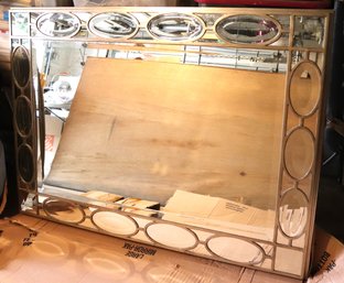 Large Modernist Style Beveled Mirror With Ovals Within A Silver Frame