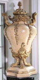 Elaborate Tessellated, Beige Stone Urn With Gilt Handles And Paw Feet.