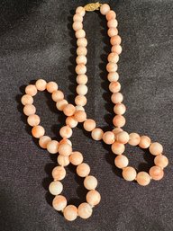 23 Inch Strand Of Polished Pink Coral Beaded Necklace