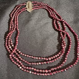 14K WG 16.5 Inch 4 Strands Of Draped Garnet Beaded Necklace