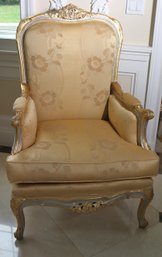 Regal Armchair With Gold And Silver Frame And Gold Damask Upholstery.