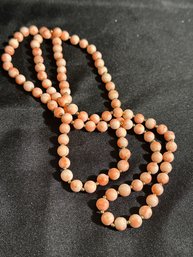 14K YG 35 Inch Polished Pink Coral Necklace With 14K Spacer Beads