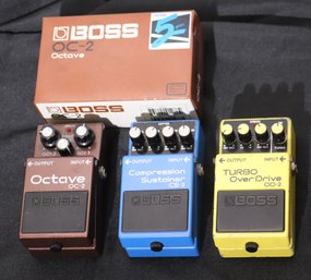 Collection Of Foot Pedals Including Boss Octave OC-2, Turbo Over Drive OD-2 And Compression Sustainer