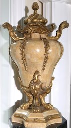 Elaborate Tessellated, Beige Stone Urn With Gilt Handles And Paw Feet.