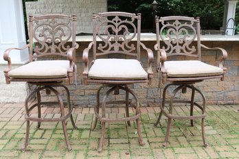 3 Cast Aluminum High Back Counter Swivel Stools With A Rustic Finish