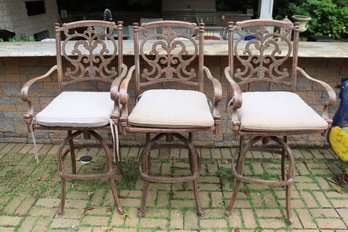 3 Cast Aluminum High Back Counter Swivel Stools With A Rustic Finish