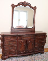 Chateau Style Mahogany Dresser With Carved Flourishes And Mirror