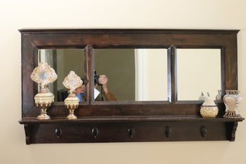 Mirrored Wall Shelf With Coat Hooks And Decorative Pieces