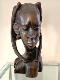 African Carved Ebony Wood Bust Of A Young Woman With Braided Hair.