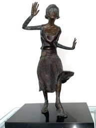 Bronze Sculpture On Marble Base Of A Roaring 20s Swinger With A Flowing Skirt.