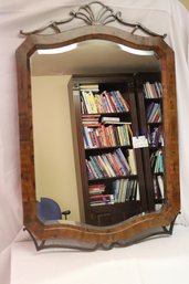 Faux Wood Beveled Mirror With Wrought Iron Accents.