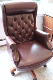 Swivel Desk Chair With A Tufted Backrest And Nail Head Accents