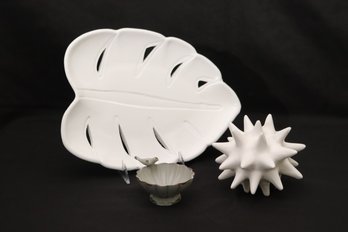 Ballard Designs Ceramic Palm Leaf, Decorative Starburst, And Small Metal Birdbath.