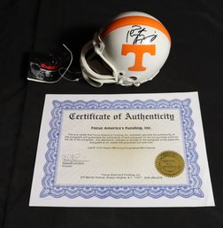 Peyton Manning Autographed Riddell Mini Helmet With COA From Focus Americas Funding Inc.
