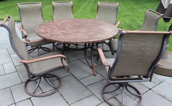 Outdoor Cast Aluminum Patio Set Includes A Large Round Table And 6 Swivel Chairs