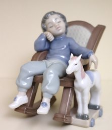 All Tuckered Out Lladro 5046 Porcelain Figurine Of A Boy In A Rocking Chair With Pull Toy