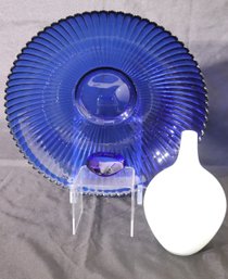 Two Decorative Blue Glass Items And A White Glass Vase.