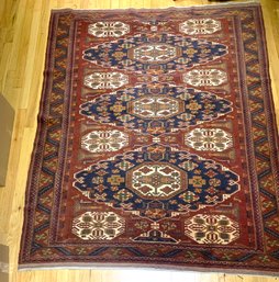 A Vintage Hand-woven Flat Weave Brown Bokhara Area Rug.