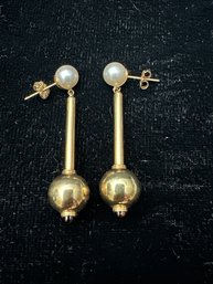 14K DANGLING PAIR OF EARRINGS WITH PEARL ACCENTS AND GARNET FINIALS