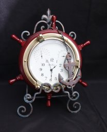 Seth Thomas Ships Wheel Clock Battery Operated On Wrought Iron Easel.
