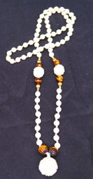 An Elegant 36 Inches Long Carved Bone Bead Necklace With Tigers Eye.