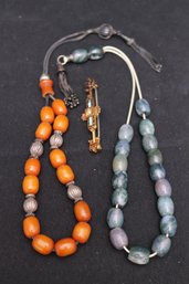 Two Prayer Bead Necklaces With Amber, Sterling, And Agate And Including A Victorian Pin.