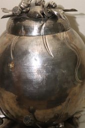 Hand Hammered Metal Jar With Lid And Lotus Flower Design.
