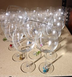 21 Wine Glasses Approximately 8 Inches, Some Have Wine Charms