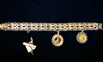 14K YG 7' Mixed Wide Link Charm Bracelet With 3 Charms.