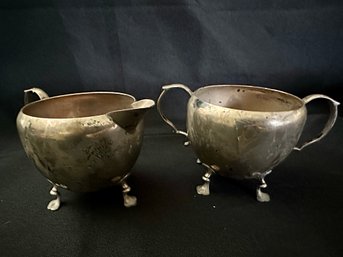 STERLING SILVER FOOTED SUGAR AND CREAMER SET BY MOSS