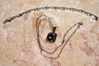 Onyx Filigree Pendant Necklace And A 925 Bracelet.