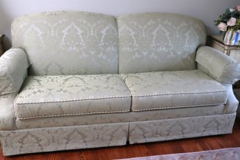 Ethan Allen Georgian Style Green Damask Roll Arm Sofa With Tailored Skirt.
