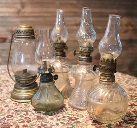 Lot Of 6 Miniature Glass Oil Lamps Measuring 6.5 To 8.5.
