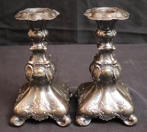 Pair Of Embossed Candlesticks Dated 1906 13/8 1946 Stamped GAB On The Foot