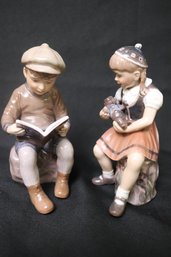 Two Dahl Jensen Porcelain Figurines Of Children Reading, Copenhagen Denmark. Approx. 3 X 6