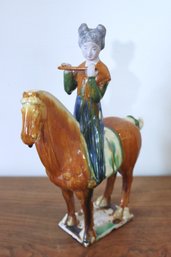 Glazed Tang Figurine Of Female Flute Player On Horse With Red Chinese Wax Seal.