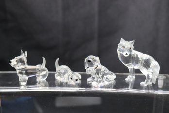 Collection Of Swarovski Dog Miniatures, Including A Wolf