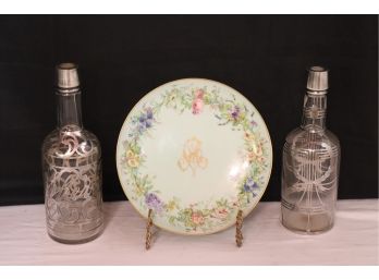 Two Antique Liquor Bottles With Heavy Silver Overlay & Decorative Hand Painted Plate