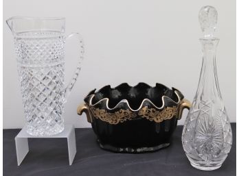 Black Shiny Porcelain Cachepot With Gold Trim, Etched Crystal Decanter And Tall Glass Pitcher.