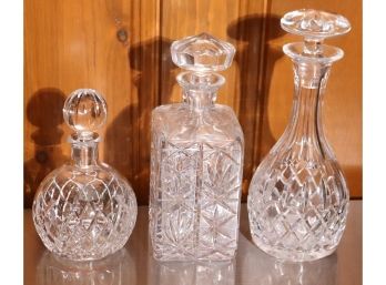 Lot Of 3 Vintage Cut Crystal Decanters In Round, Oval And Square Shapes.