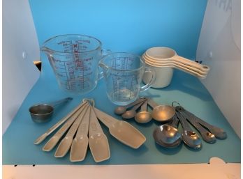 Lot Of Measuring Cups And Spoons