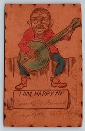 C. 1910s Artist Folk Art Playing Banjo Postcard On Leather