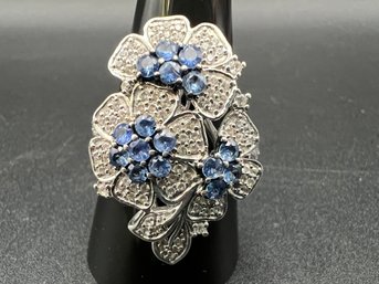 Sterling Silver .925 STS Chuck Clemency Tanzanite Flower Ring Size 10 Weighs .29 TOZ