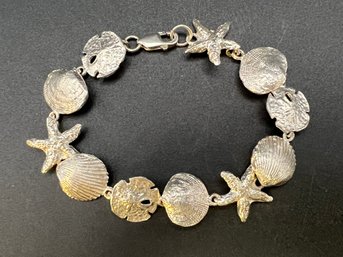 Sterling Silver .925 Seashell 7 3/4 Bracelet Sandollar, Starfish, Scallop Ocean Weighs  .68 TOZ