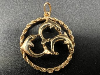 14KT Yellow Gold 3 Dolphin Circle Rope 1 1/4 Pendant Weighs 3.7 Grams