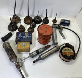 Collection Of Vintage Oil Cans And Other Automobile Accessories