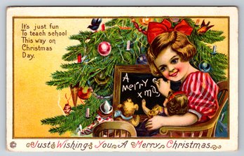 1910's Christmas Embossed Postcard Of Young Girl With Doll