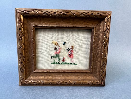 Vintage Small Framed Needlepoint Of Children Catching Butterflies.